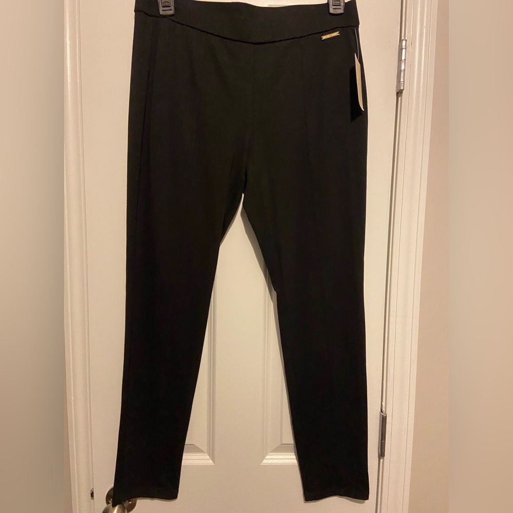 Black with gold accent professional leggings.